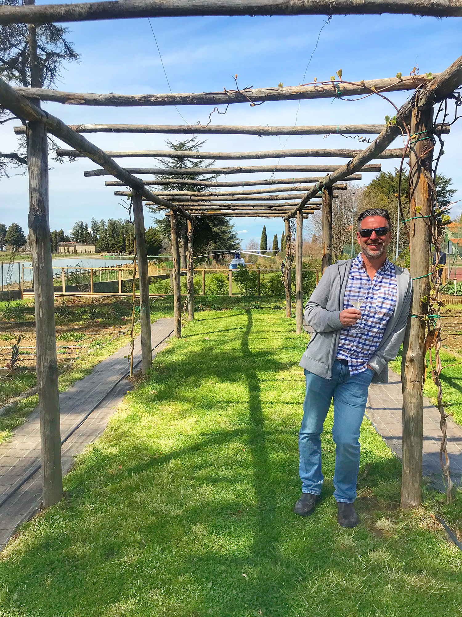 Dean Horvath standing at a winery in Tuscany.
